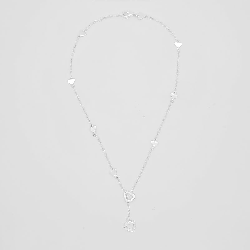 top view of romantic sterling silver chain necklace featuring two larger heart pendants and various small hearts throughout chain